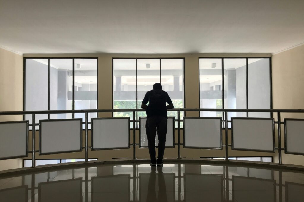 Man dreaming of climbing to the next level at work